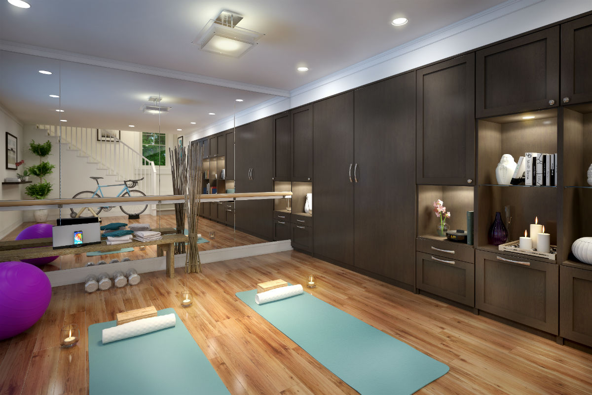 Murphy Bed in basement, folded up, yoga mats on floor